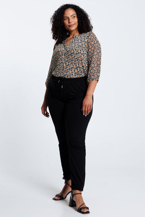 Unifarbene Viskosehose mit engem, niedrigem Knopf-Paprika-8