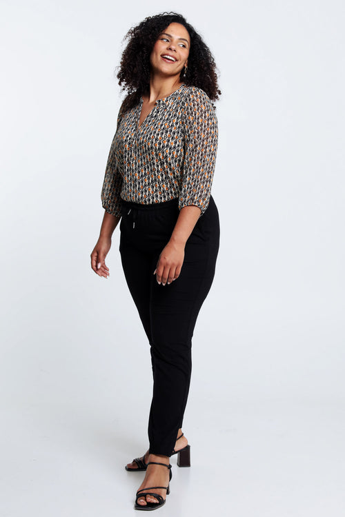 Unifarbene Viskosehose mit engem, niedrigem Knopf-Paprika-10