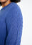 Unifarbener Pullover mit Zopfmuster und Tupfen an den Ärmeln