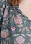 Bluse mit Muster aus indischen Blumen und Folie